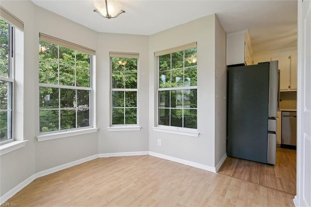 102 Saddle Dr, Newport News, VA 23602 - unfurnished dining area featuring light wood finished floors and healthy amount of natural light