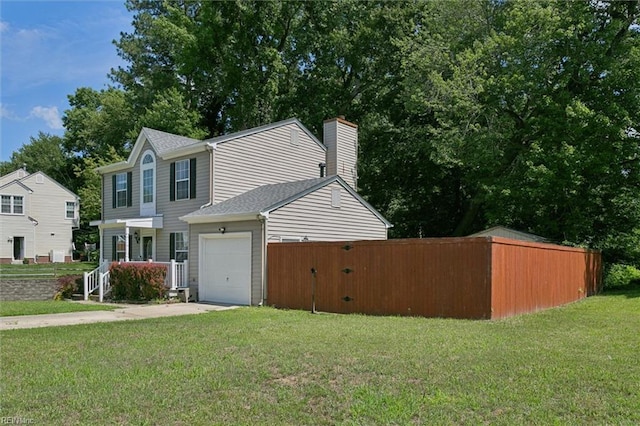 102 Saddle Dr, Newport News, VA 23602 - view of front of property featuring a garage, a chimney, and driveway