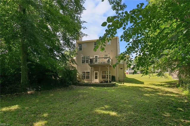 102 Saddle Dr, Newport News, VA 23602 - back of property with a lawn, a chimney, and a deck