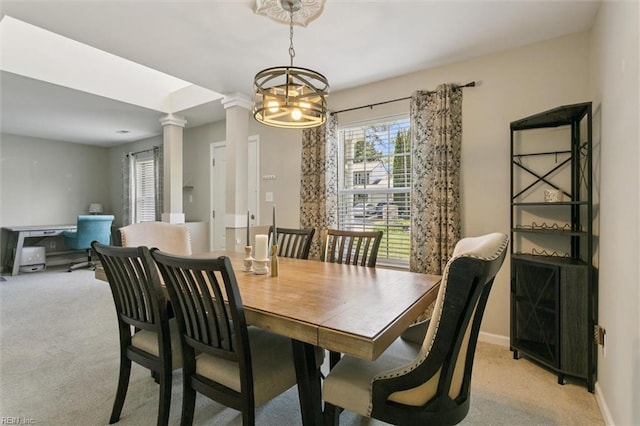 102 Saddle Dr, Newport News, VA 23602 - dining room featuring light carpet, ornate columns, and a chandelier