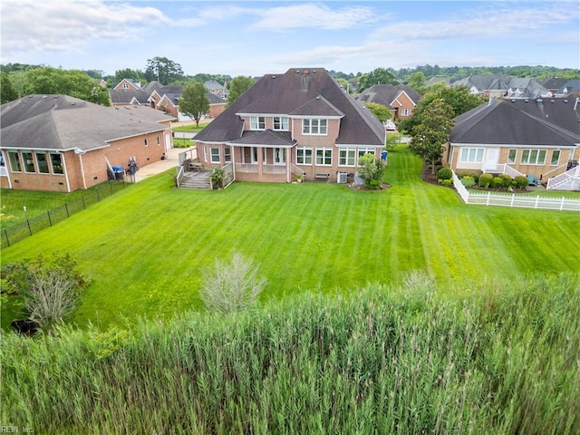 1938 Lancing Crest Ln, Chesapeake, VA 23323 - rear view of house featuring a fenced backyard and a residential view