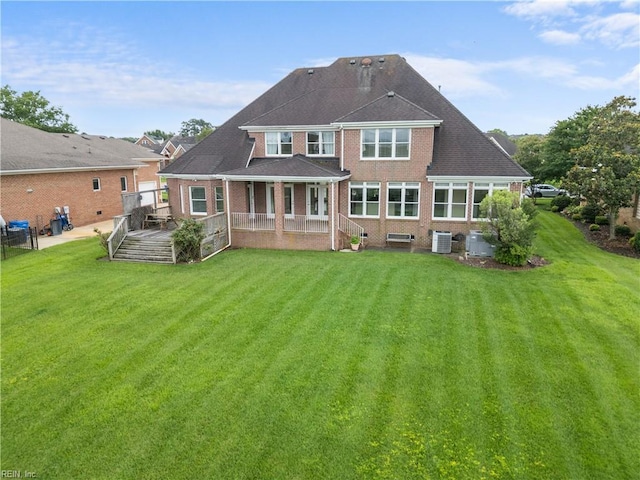 1938 Lancing Crest Ln, Chesapeake, VA 23323 - back of house with a yard and brick siding