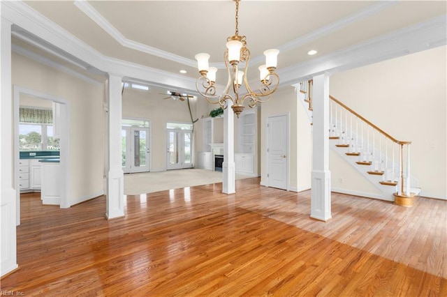 1938 Lancing Crest Ln, Chesapeake, VA 23323 - unfurnished dining area with light wood-style floors, ceiling fan, plenty of natural light, a chandelier, and ornamental molding