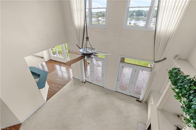 1938 Lancing Crest Ln, Chesapeake, VA 23323 - entrance foyer with french doors, ceiling fan, a towering ceiling, and a water view
