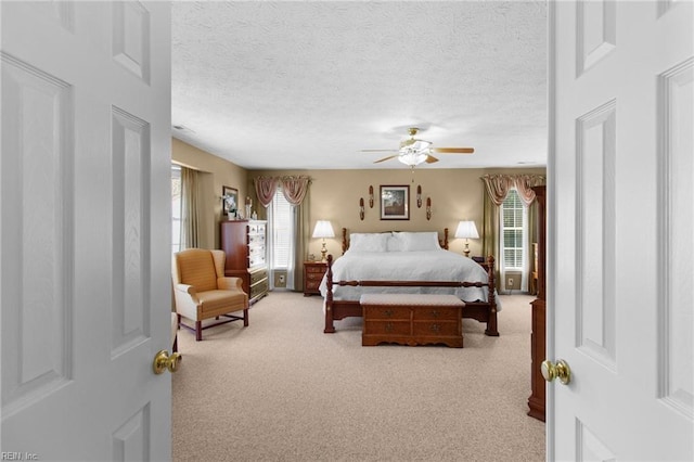 203 Vixen Ct, Yorktown, VA 23693 - bedroom featuring light carpet, a textured ceiling, and ceiling fan
