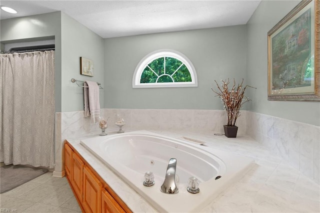203 Vixen Ct, Yorktown, VA 23693 - full bath featuring a tub with jets and tile patterned floors