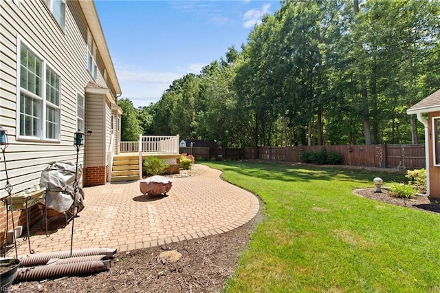203 Vixen Ct, Yorktown, VA 23693 - fenced backyard featuring a patio and a wooden deck