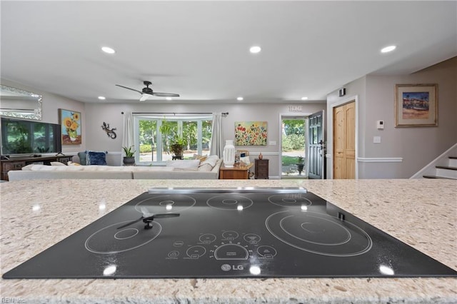 205 Ridgeland Dr, Smithfield, VA 23430 - kitchen featuring black electric cooktop, open floor plan, healthy amount of natural light, recessed lighting, and a ceiling fan