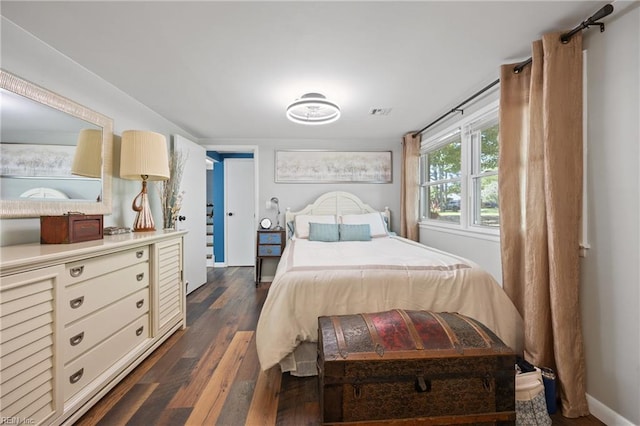 205 Ridgeland Dr, Smithfield, VA 23430 - bedroom with dark wood finished floors and baseboards