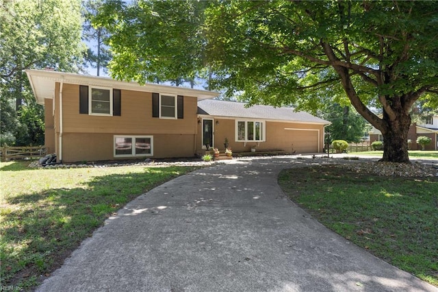 205 Ridgeland Dr, Smithfield, VA 23430 - split level home with a garage and driveway