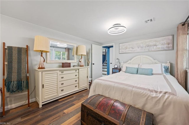 205 Ridgeland Dr, Smithfield, VA 23430 - bedroom with dark wood-style flooring