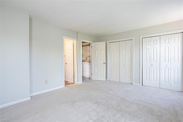 751 S Lake Cir, Chesapeake, VA 23322 - unfurnished bedroom featuring carpet floors and multiple closets