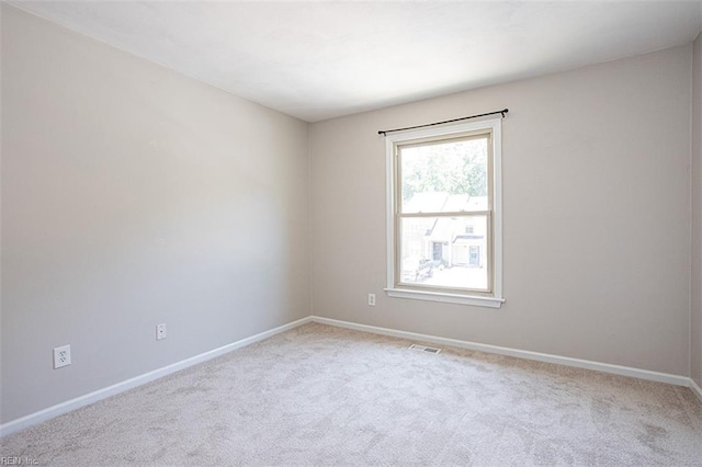 751 S Lake Cir, Chesapeake, VA 23322 - spare room featuring light colored carpet and baseboards