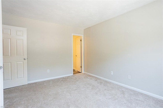 751 S Lake Cir, Chesapeake, VA 23322 - carpeted empty room with baseboards