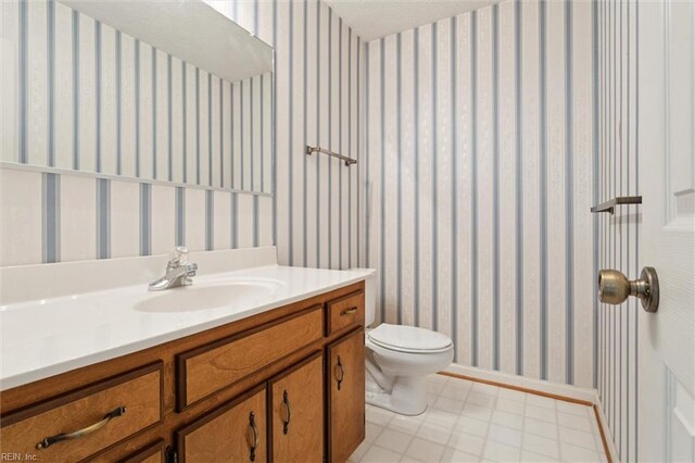 104 Hounds Chase Chase, Yorktown, VA 23693 - bathroom featuring vanity and wallpapered walls