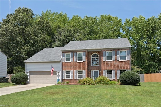 104 Hounds Chase Chase, Yorktown, VA 23693 - colonial-style house with a garage, concrete driveway, and brick siding