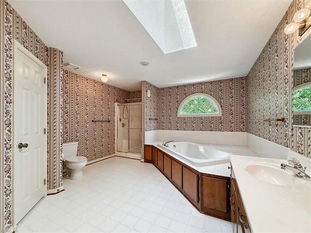 104 Hounds Chase Chase, Yorktown, VA 23693 - full bathroom featuring wallpapered walls, a stall shower, tile patterned floors, a bath, and a skylight