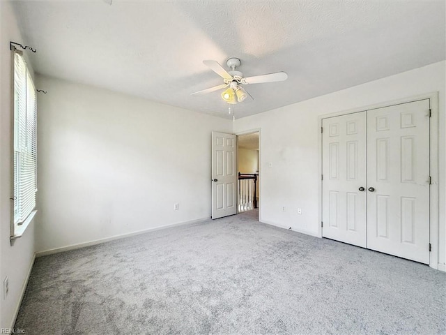 104 Hounds Chase Chase, Yorktown, VA 23693 - unfurnished bedroom featuring carpet flooring, a closet, and ceiling fan