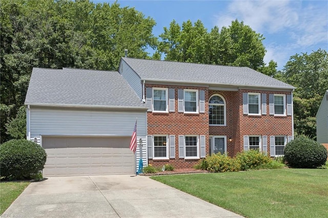 104 Hounds Chase Chase, Yorktown, VA 23693 - colonial inspired home with a garage, driveway, a front lawn, brick siding, and roof with shingles