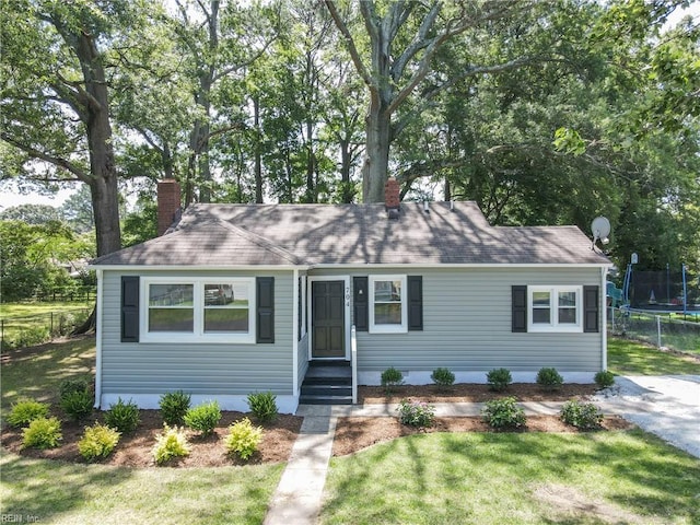 704 73rd St, Newport News, VA 23605 - view of front of house with a chimney and a shingled roof