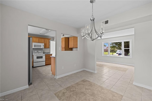 3012 Camelot Blvd, Chesapeake, VA 23323 - unfurnished dining area with a chandelier and light tile patterned floors