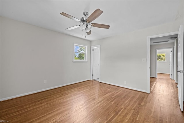 3012 Camelot Blvd, Chesapeake, VA 23323 - unfurnished room with wood finished floors, healthy amount of natural light, and a ceiling fan