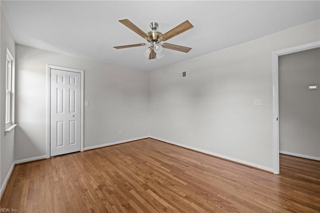 3012 Camelot Blvd, Chesapeake, VA 23323 - empty room with ceiling fan and wood finished floors