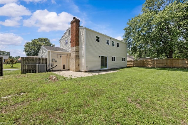 3012 Camelot Blvd, Chesapeake, VA 23323 - back of house featuring a chimney and a patio area
