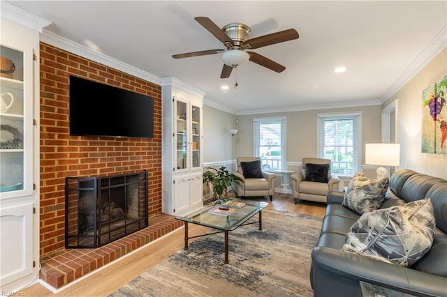520 Foxgate Quarter Quarter, Chesapeake, VA 23322 - living room with wood finished floors, ornamental molding, a ceiling fan, a brick fireplace, and recessed lighting