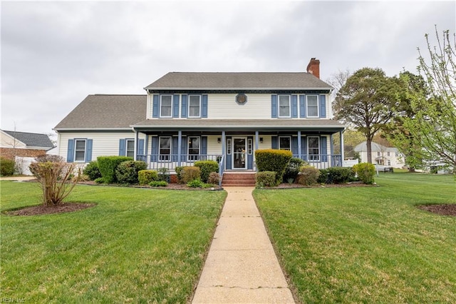 520 Foxgate Quarter Quarter, Chesapeake, VA 23322 - colonial inspired home with a chimney, a front lawn, and covered porch