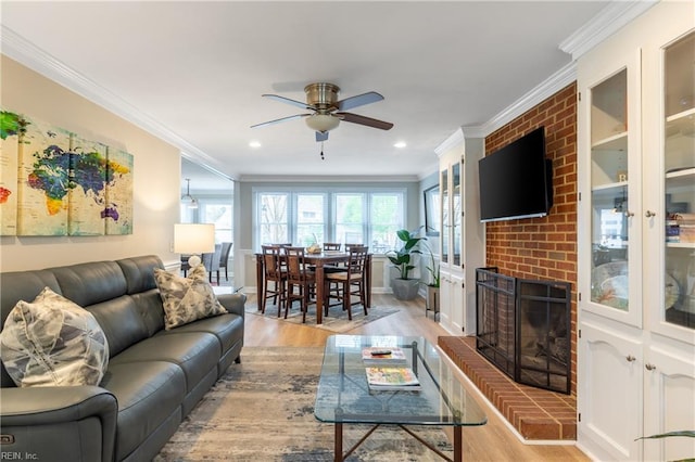 520 Foxgate Quarter Quarter, Chesapeake, VA 23322 - living room featuring ceiling fan, crown molding, light wood-type flooring, a brick fireplace, and recessed lighting