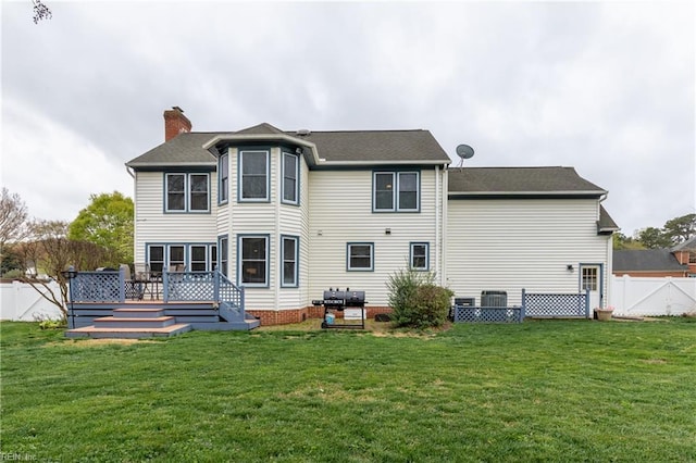 520 Foxgate Quarter Quarter, Chesapeake, VA 23322 - back of house with a fenced backyard, a deck, and a chimney