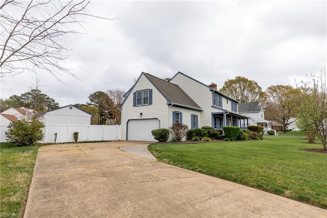 520 Foxgate Quarter Quarter, Chesapeake, VA 23322 - view of front of house featuring concrete driveway, an attached garage, and a chimney