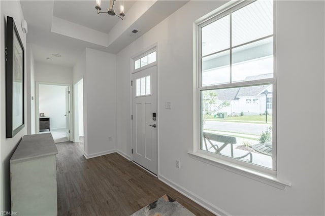202 Oxford Ave Unit 46-1, Smithfield, VA 23430 - entryway featuring a chandelier, dark wood-type flooring, and a raised ceiling