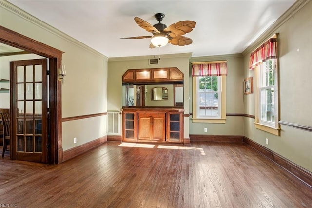 515 Beach Rd, Hampton, VA 23664 - unfurnished living room with wood finished floors, ceiling fan, and crown molding