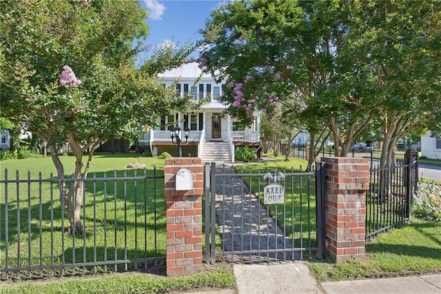 515 Beach Rd, Hampton, VA 23664 - obstructed view of property featuring a fenced front yard, a porch, and a gate