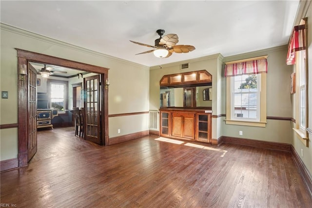 515 Beach Rd, Hampton, VA 23664 - unfurnished living room featuring ceiling fan, wood finished floors, and ornamental molding