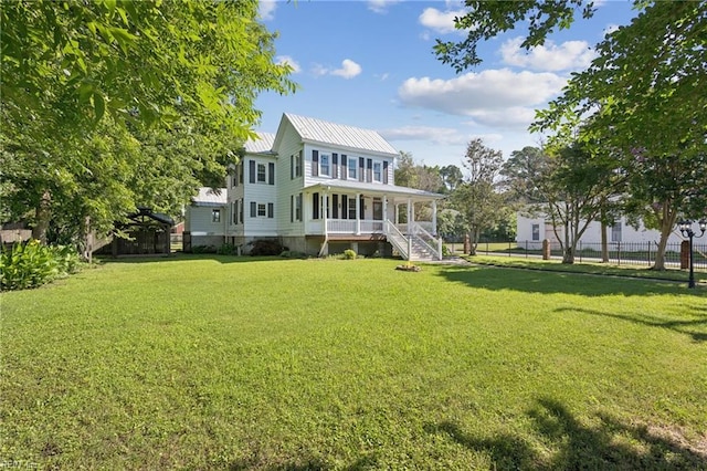 515 Beach Rd, Hampton, VA 23664 - back of property with a metal roof, covered porch, and stairway