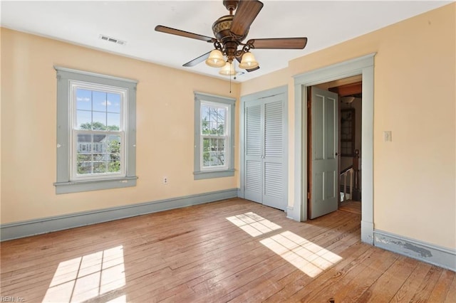 515 Beach Rd, Hampton, VA 23664 - spare room featuring wood-type flooring, ceiling fan, and a baseboard radiator