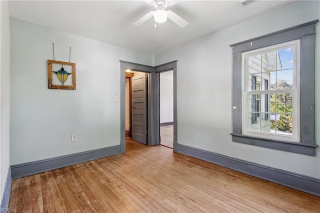515 Beach Rd, Hampton, VA 23664 - unfurnished room with wood finished floors and a ceiling fan