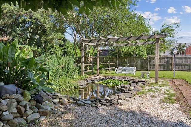 515 Beach Rd, Hampton, VA 23664 - view of yard featuring a pergola and a small pond