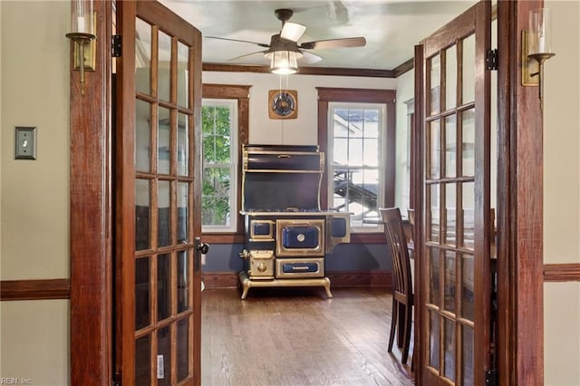 515 Beach Rd, Hampton, VA 23664 - home office with plenty of natural light, ceiling fan, wood finished floors, ornamental molding, and french doors