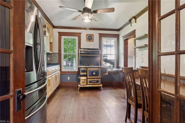515 Beach Rd, Hampton, VA 23664 - kitchen featuring crown molding, ceiling fan, dark wood-style floors, stainless steel fridge, and backsplash
