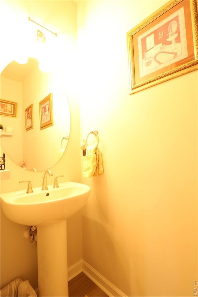 1815 Honey Milk Rd, Chesapeake, VA 23323 - bathroom featuring a sink and wood finished floors