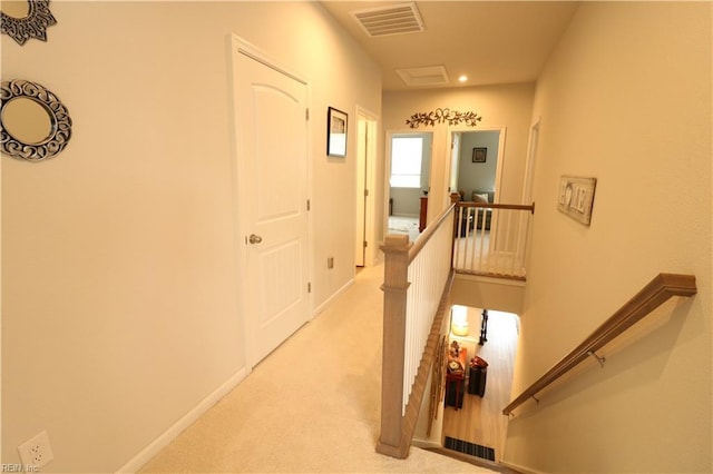 1815 Honey Milk Rd, Chesapeake, VA 23323 - hall with an upstairs landing, light colored carpet, and recessed lighting