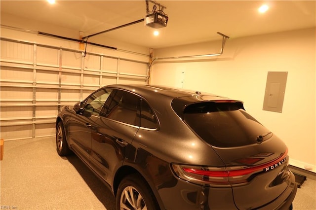 1815 Honey Milk Rd, Chesapeake, VA 23323 - garage featuring electric panel and a garage door opener