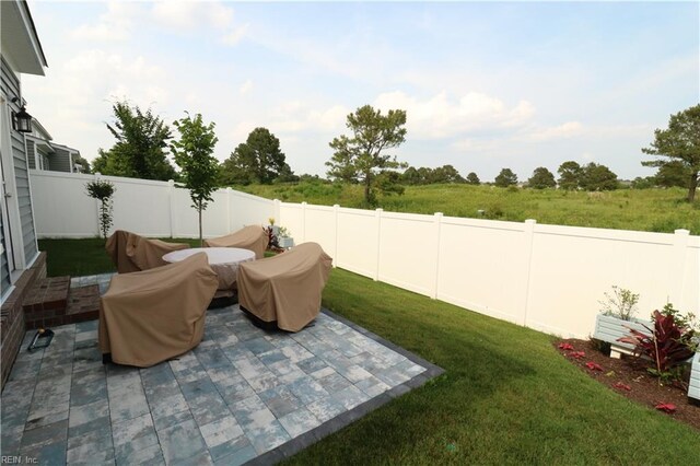 1815 Honey Milk Rd, Chesapeake, VA 23323 - fenced backyard with a patio