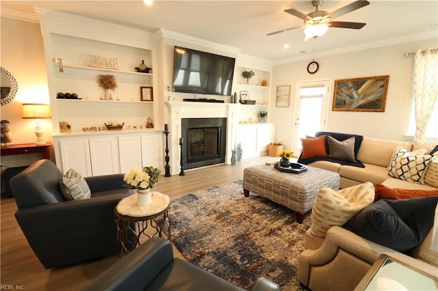 1815 Honey Milk Rd, Chesapeake, VA 23323 - living room with ornamental molding, a fireplace, wood finished floors, a ceiling fan, and built in features