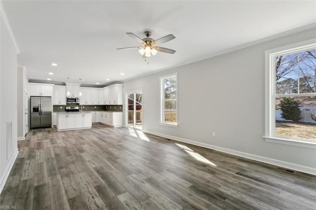461 Joy Dr, Hampton, VA 23666 - unfurnished living room with crown molding, a ceiling fan, wood finished floors, and recessed lighting