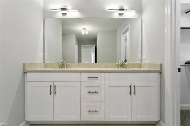 461 Joy Dr, Hampton, VA 23666 - bathroom featuring double vanity and baseboards